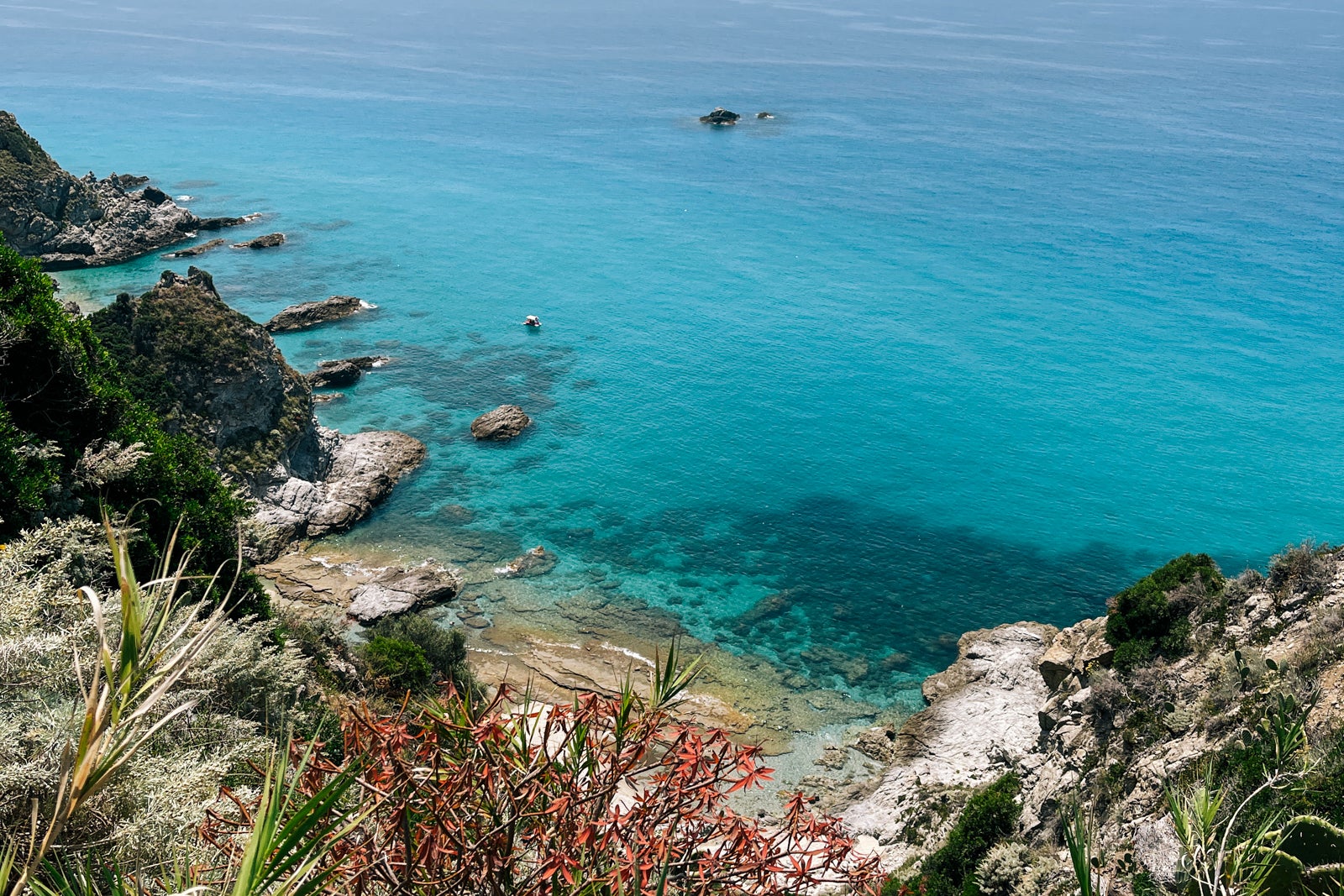 Here's why you should go to Calabria instead of Rome or Milan Emerald green water at Capo Vaticano, Vibo Valentia, Calabria, Italy