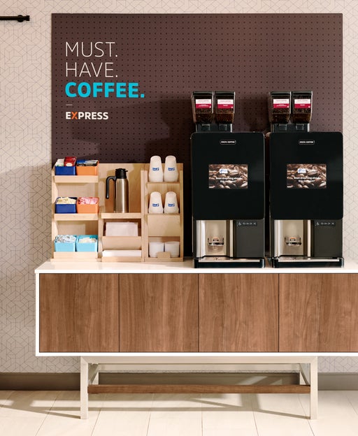 You can get a free cup of coffee at Holiday Inn Express hotels next weekend — even if you're not a guest