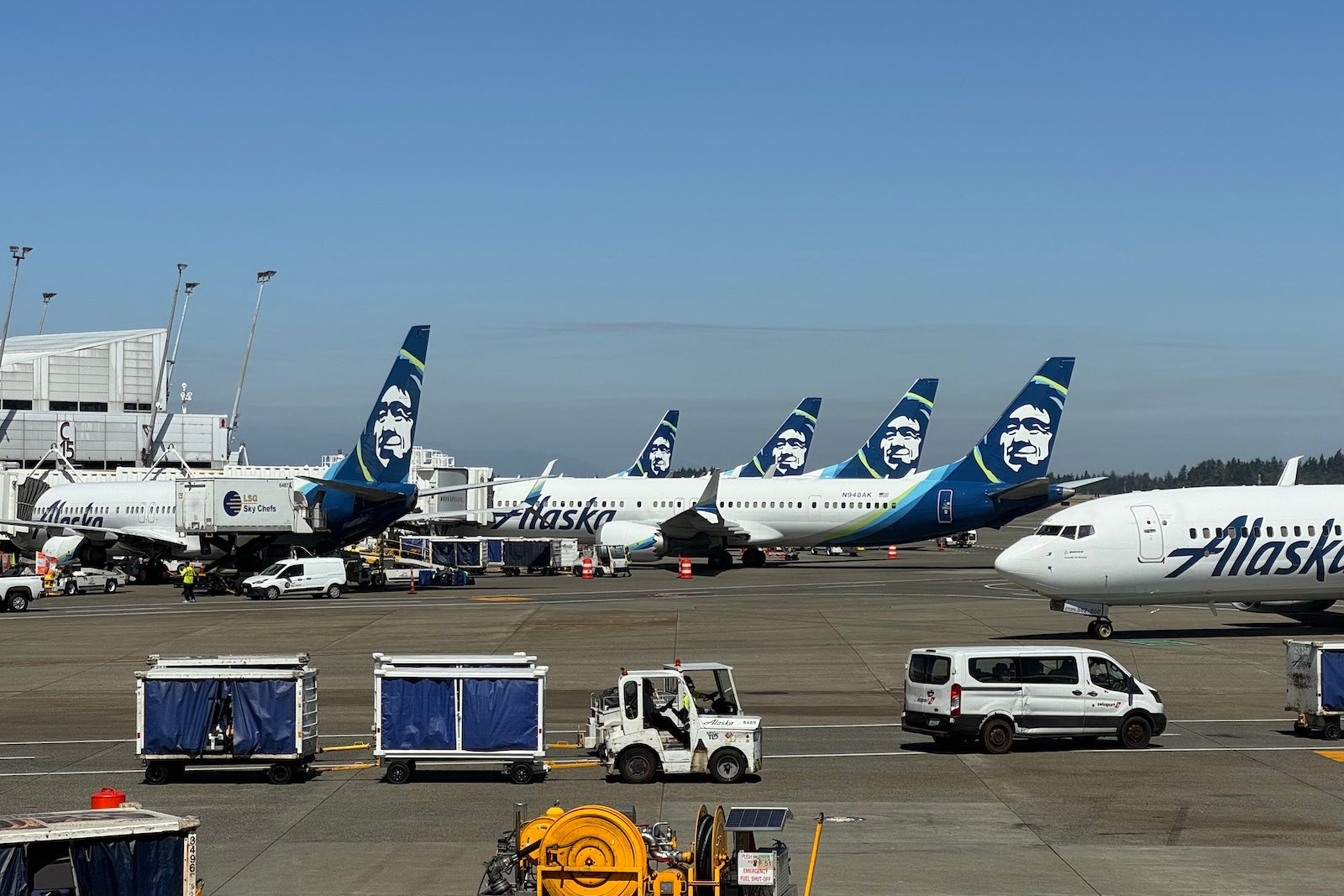 Alaska Airlines aircraft at Seattle-Tacoma International Airport (SEA).