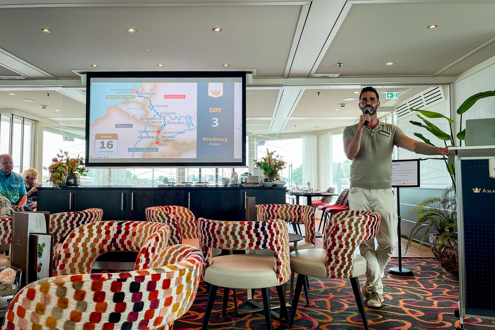 AmaWaterway's cruise manager giving lecture on Rhine River cruise.