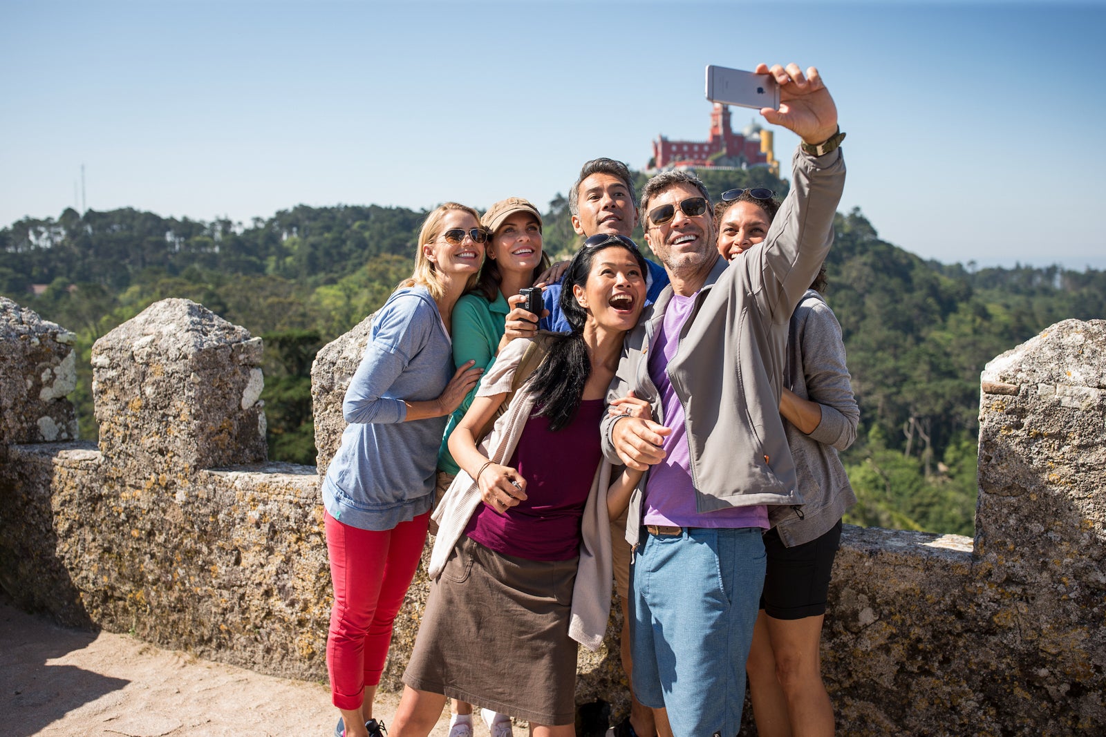 The ultimate guide to guided, small-group and independent tours A Globus tour group on a hike to a castle