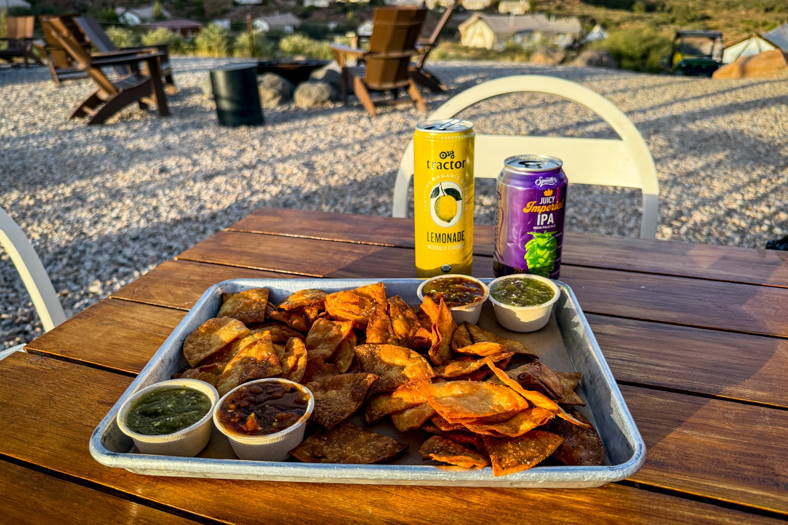 tortilla chips and beer on a table