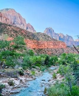 river with red rocks in the background