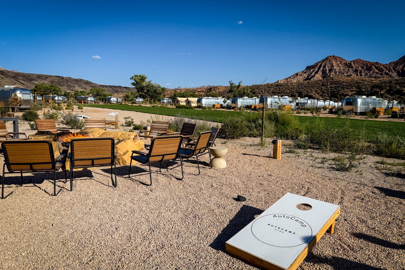 cornhole boards and a fire pit