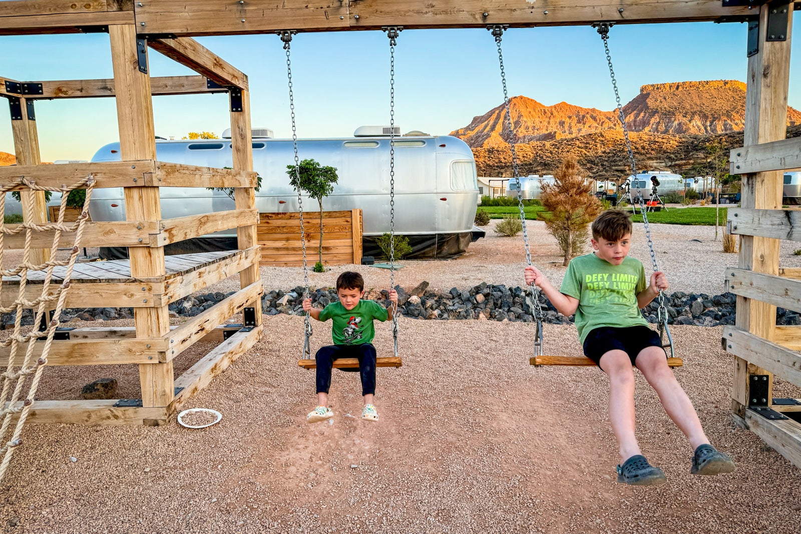 boys on swingset