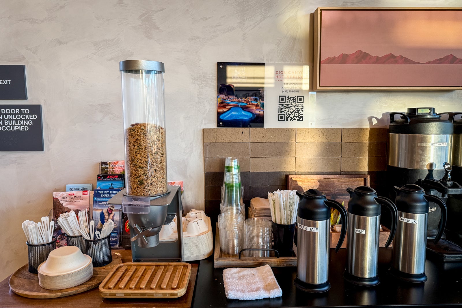granola and milk on a counter
