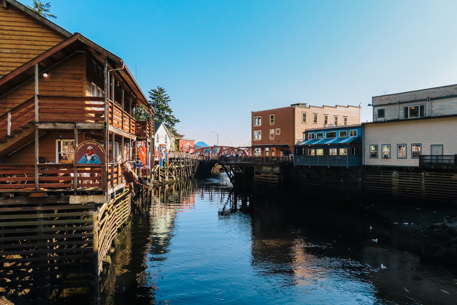 old buildings built above a creek