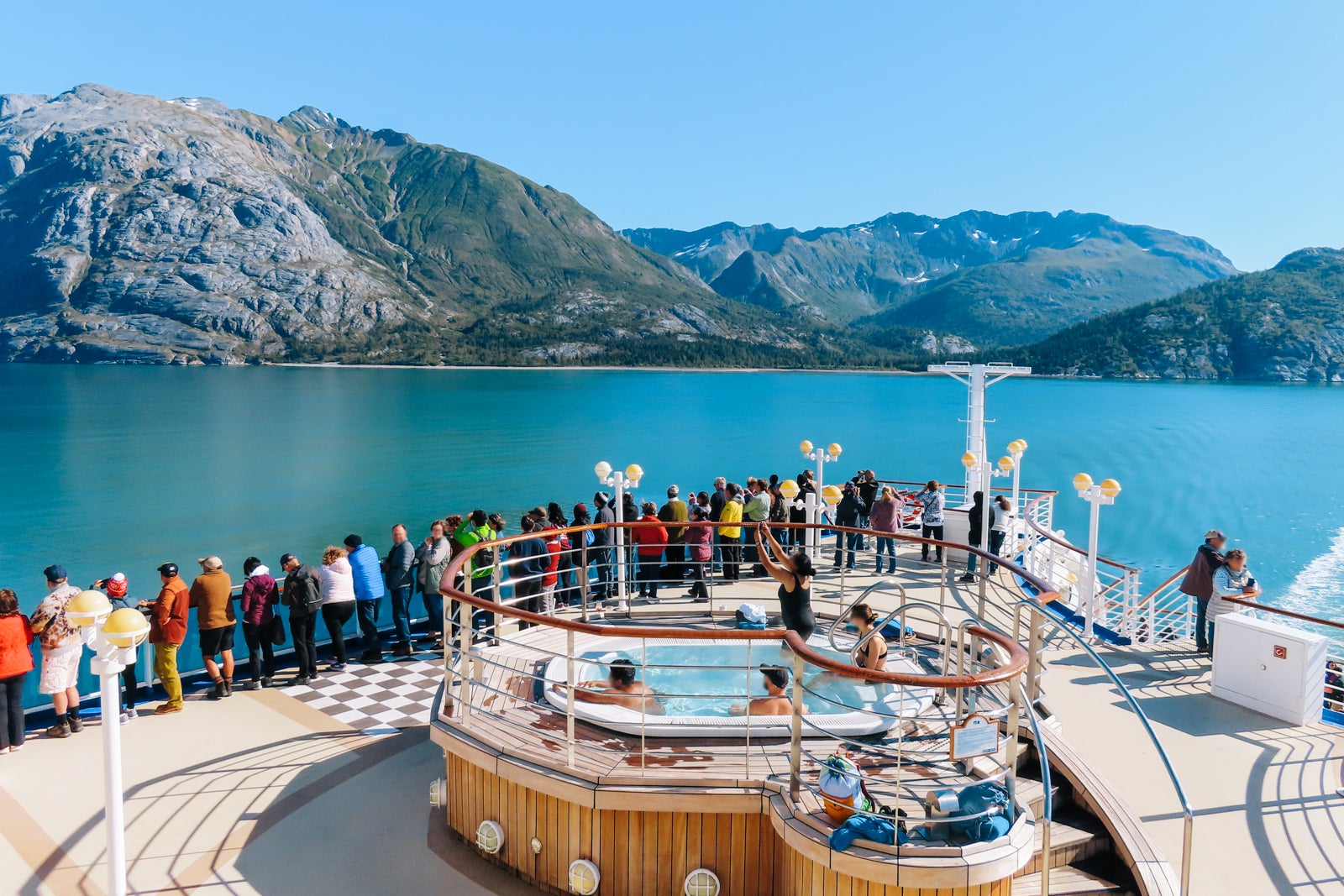 view of people watching scenery on a cruise ship
