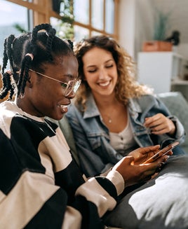 Friends shopping at home