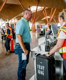 Why do airports invite fake passengers to test new terminals?