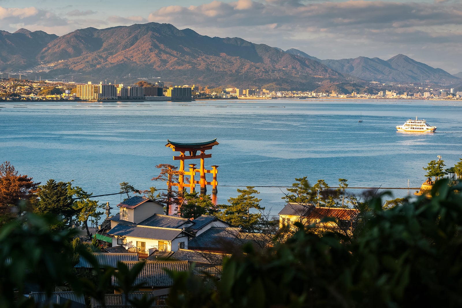 High Angle View of Great floating gate (O-Torii) and Hiroshima city view from Miyajima Island, Japan