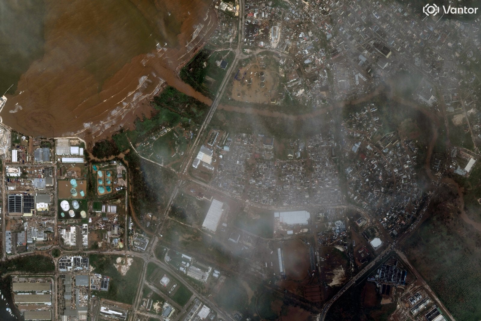 after" satellite imagery shows widespread muddy floodwater flowing into coastal areas near Montego Bay on October 29, 2025