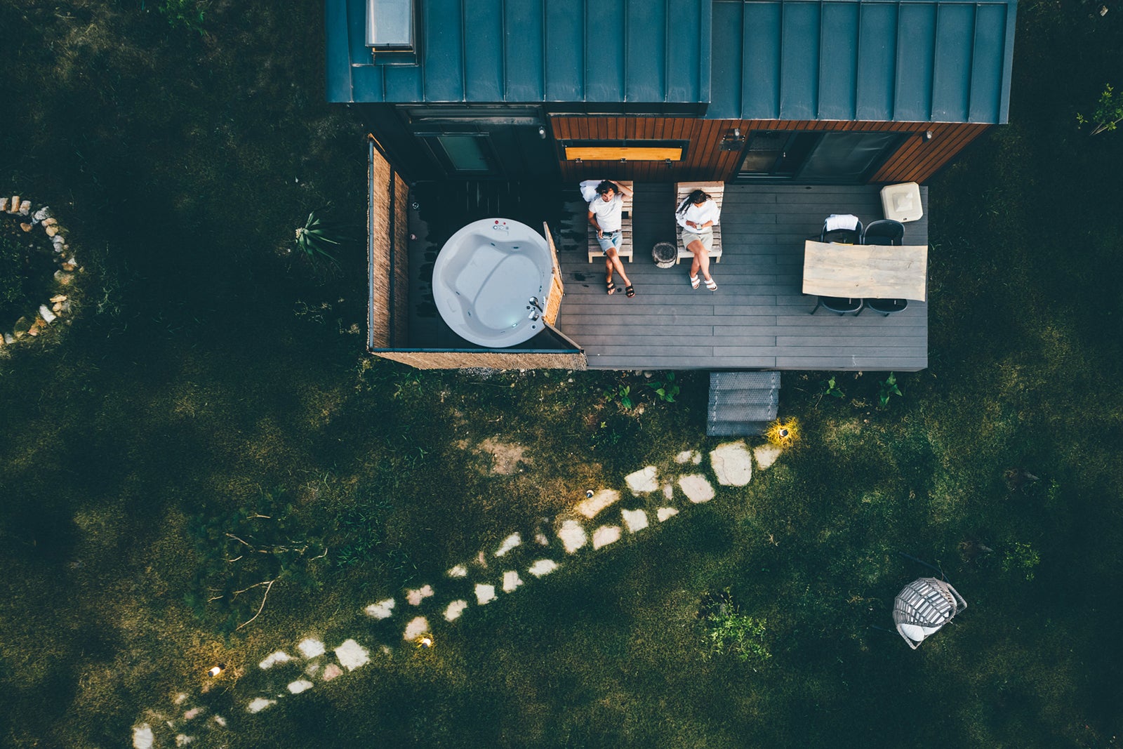 Couple lounging on deck