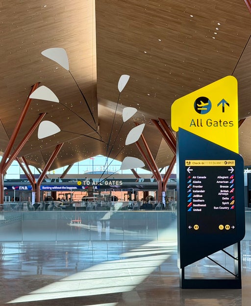Pittsburgh's sleek $1.7B new terminal directs flyers with futuristic new signage
