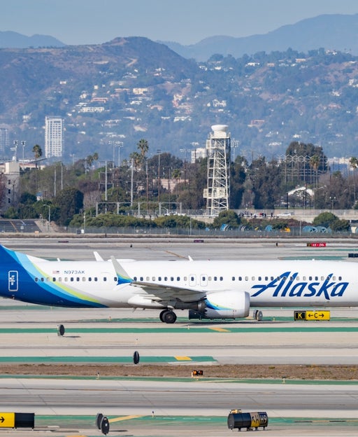 An Alaska Airlines plane taxis at Los Angeles International Airport (LAX). AARONP BAUER GRIFFIN/GC IMAGES VIA GETTY IMAGES
