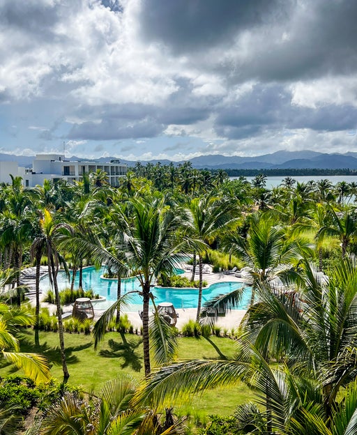 View of the pool and water from a Zemi Miches hotel balcony