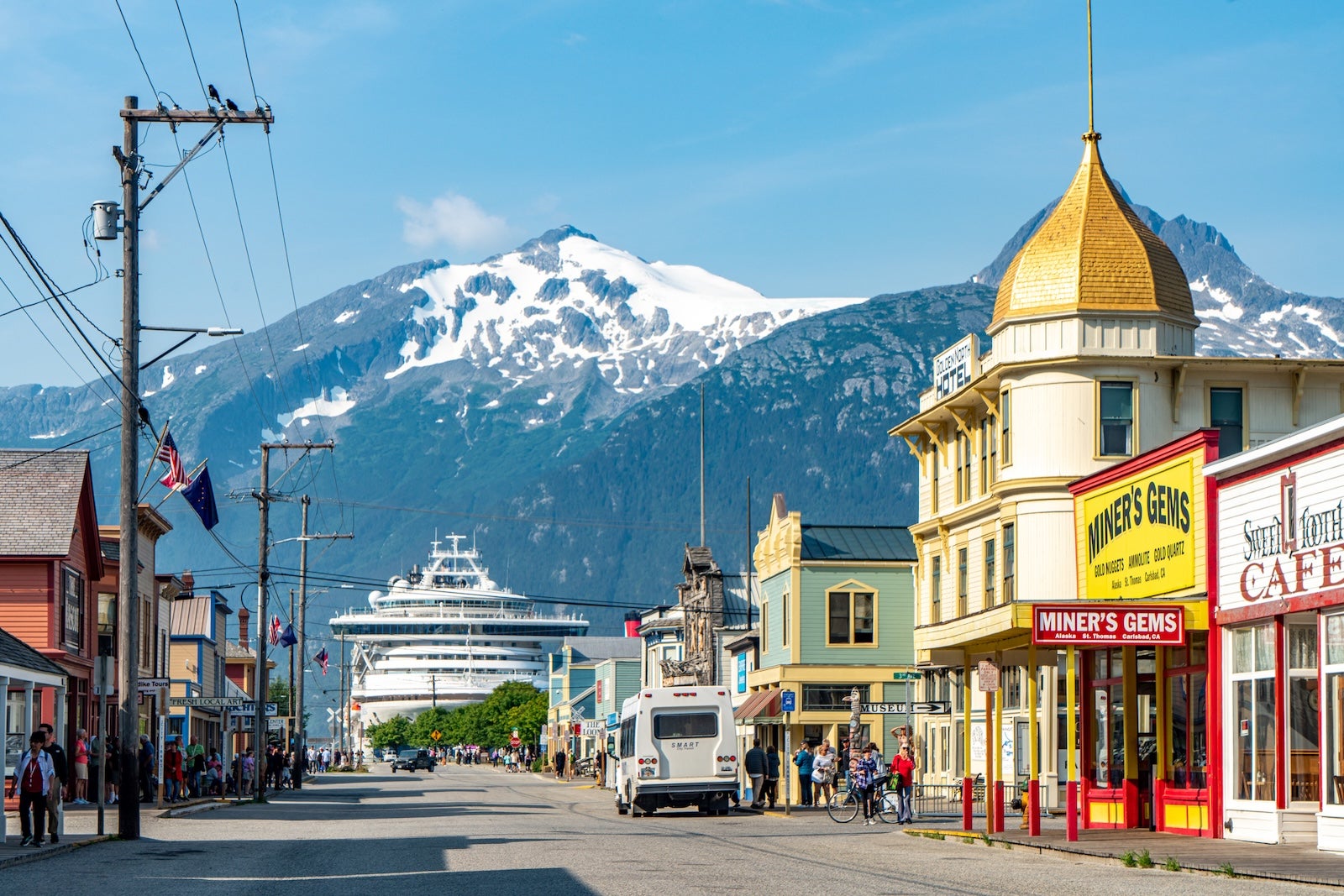 Skagway, Alaska - July 30, 2023: Tourists are walking on the street for shopping. Skagway townscape in the morning, Alaska, USA.
