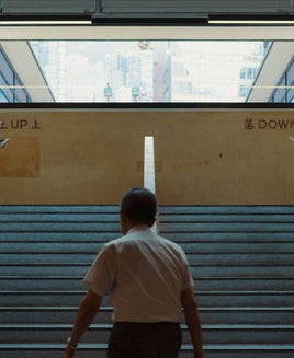 Man walking up stairs