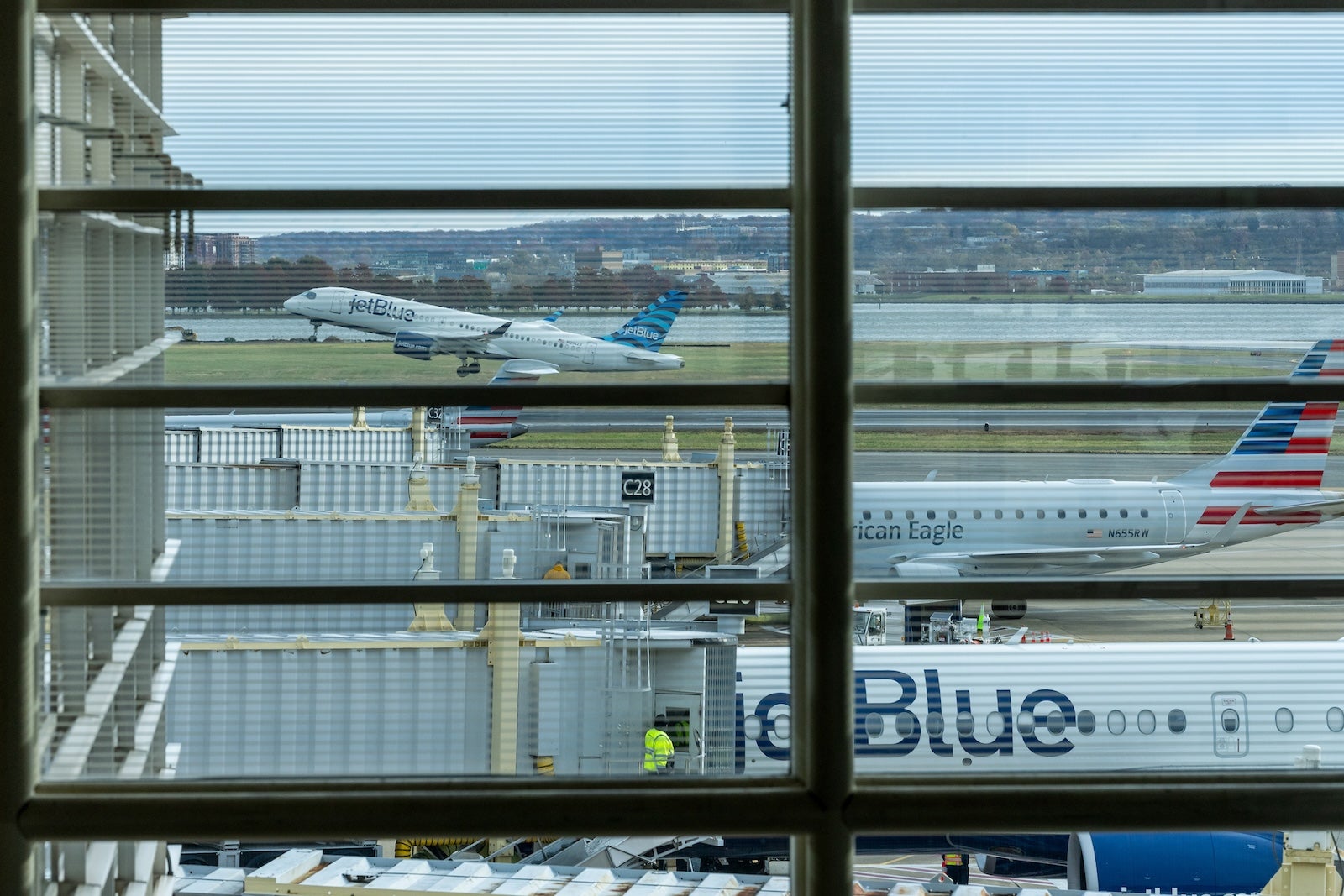 A plane takes off at Ronald Reagan Washington National Airport (DCA)