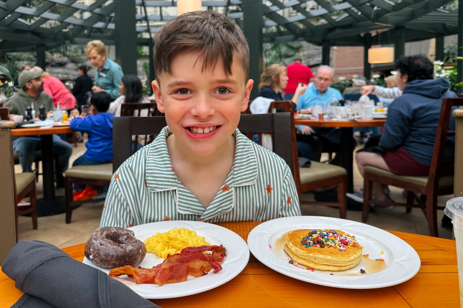 child eating breakfast