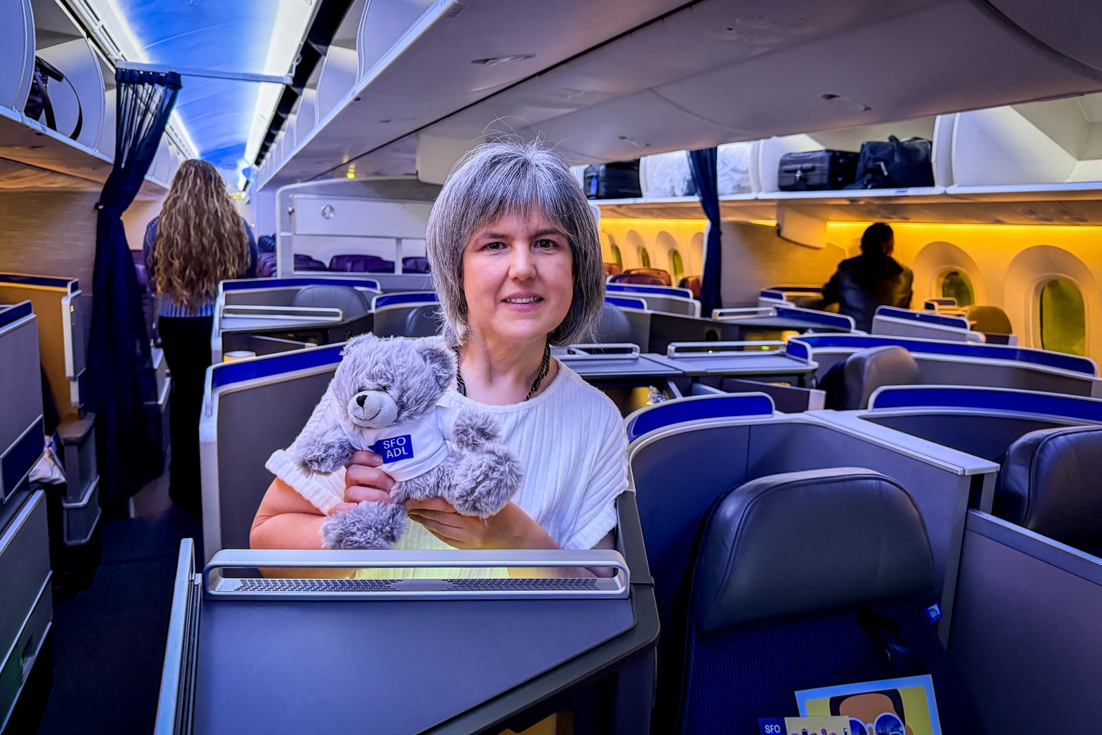 TPGer Andrea Rotondo with a stuffed koala aboard United's inaugural flight from San Francisco to Adelaide