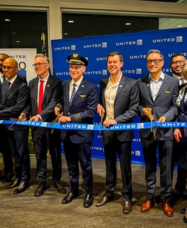 ribbon cutting before United's first flight from San Francisco to Adelaide, Australia