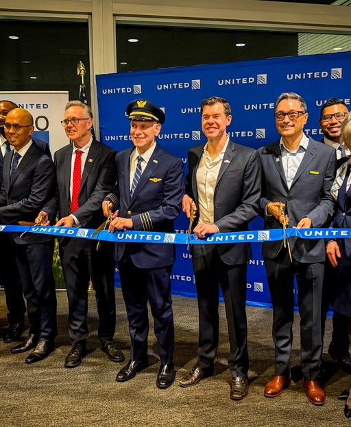 ribbon cutting before United's first flight from San Francisco to Adelaide, Australia