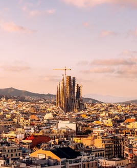 Barcelona cityscape with Sagrada Familia at sunset, aerial view, Catalonia, Spain