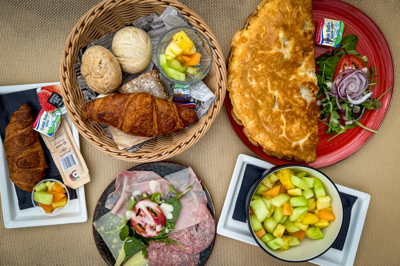 breakfast foods on plates at restaurant