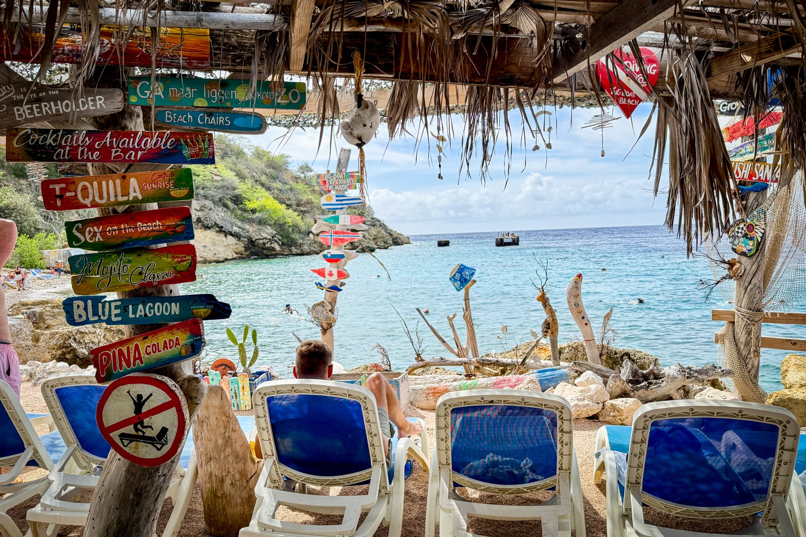 beach chairs in front of the ocean
