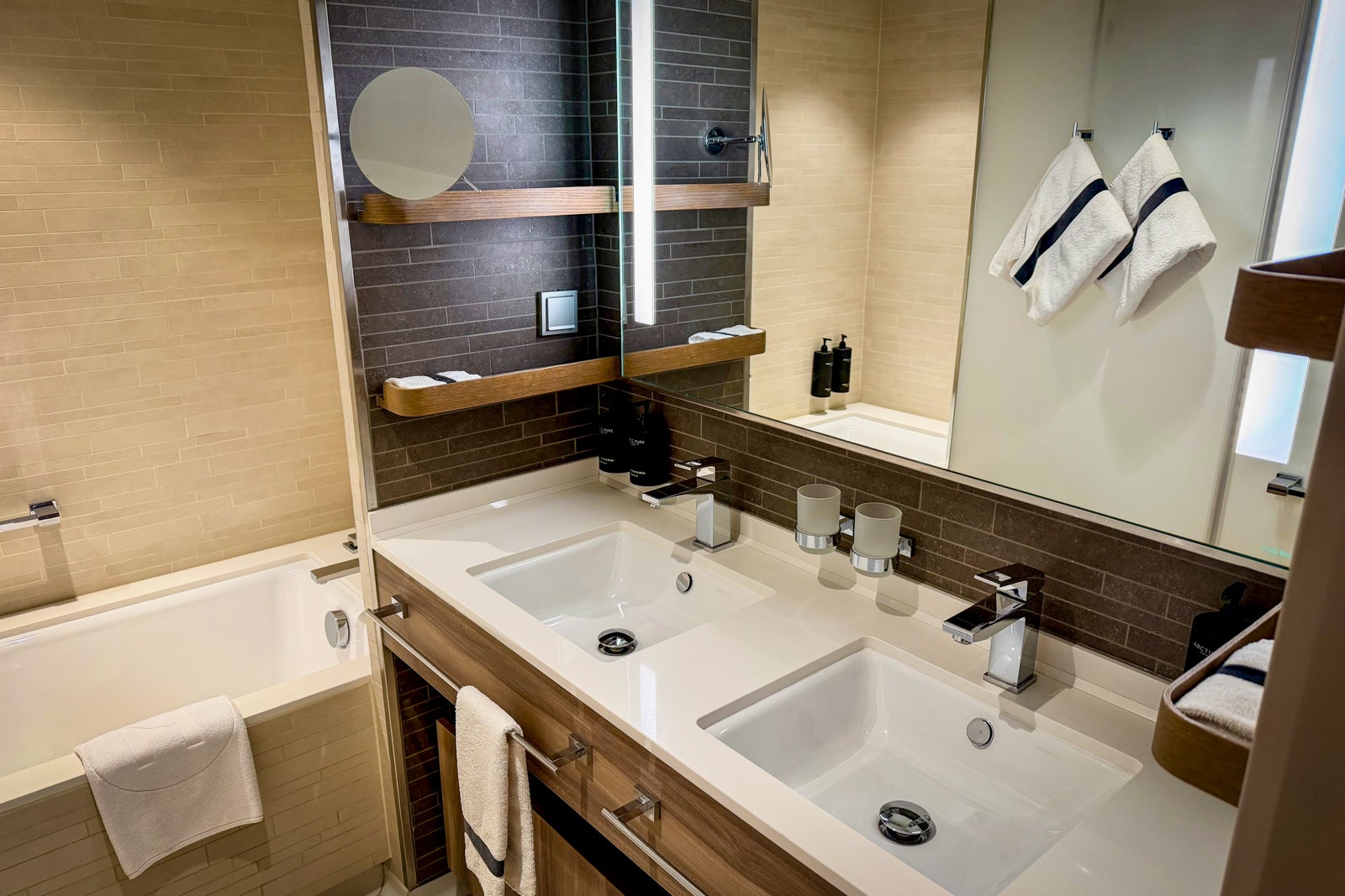 Suites on Roald Amundsen feature bathrooms with double sinks, showers and bathtubs.