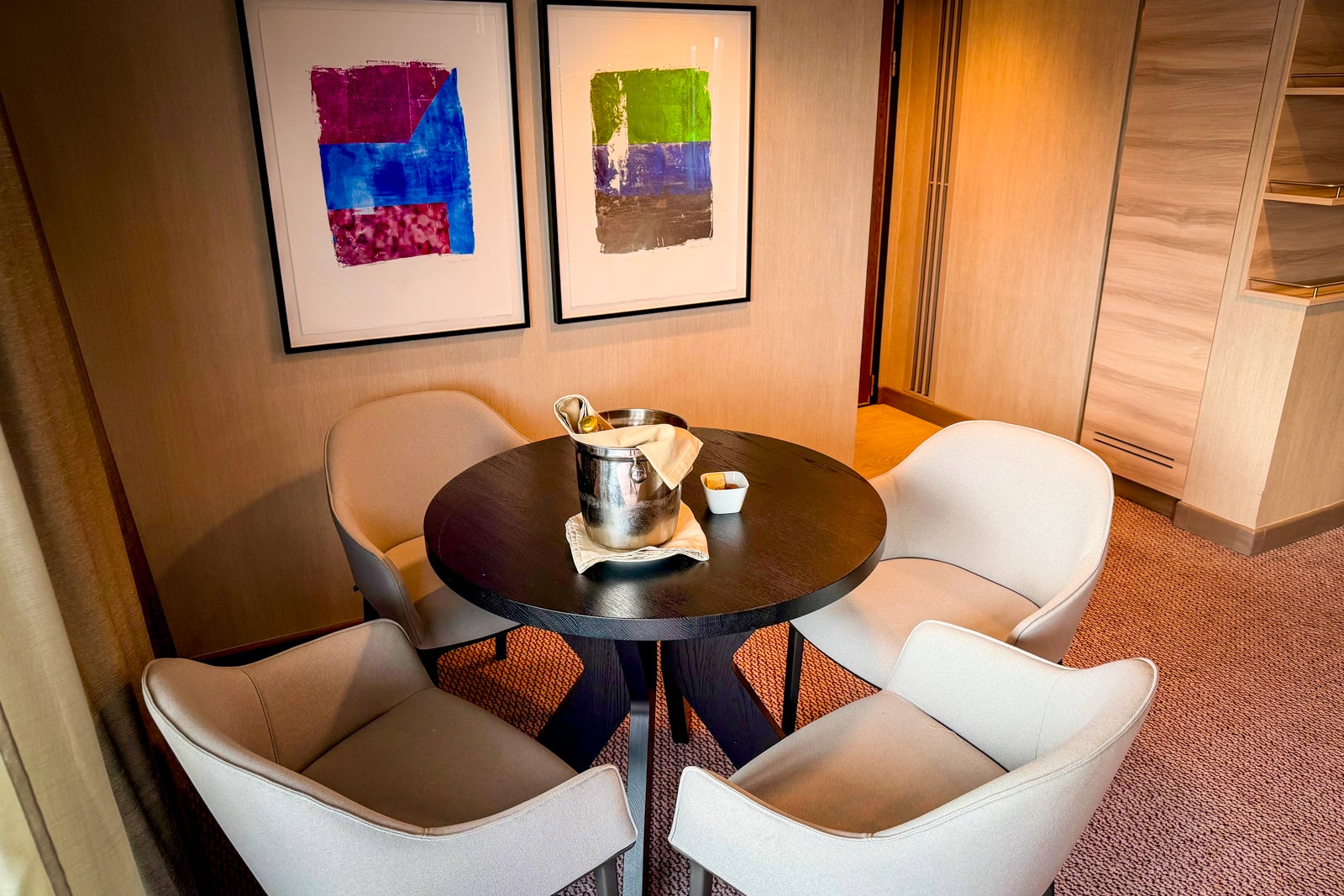 A seating area in a suite on Roald Amundsen.