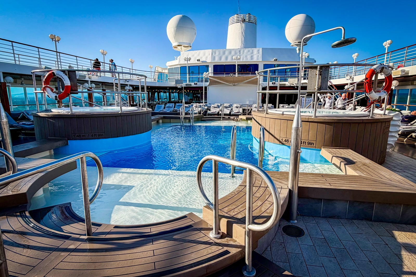 Two hot tubs flank the ship's main pool.