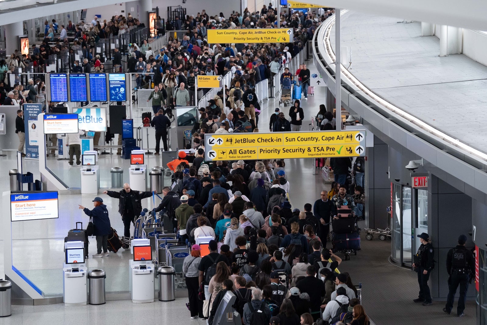 TSA lines surge: Tips for getting through security this week – The Points Guy