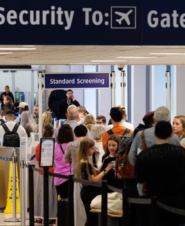 TSA lines persist as Congress considers ending partial government shutdown
