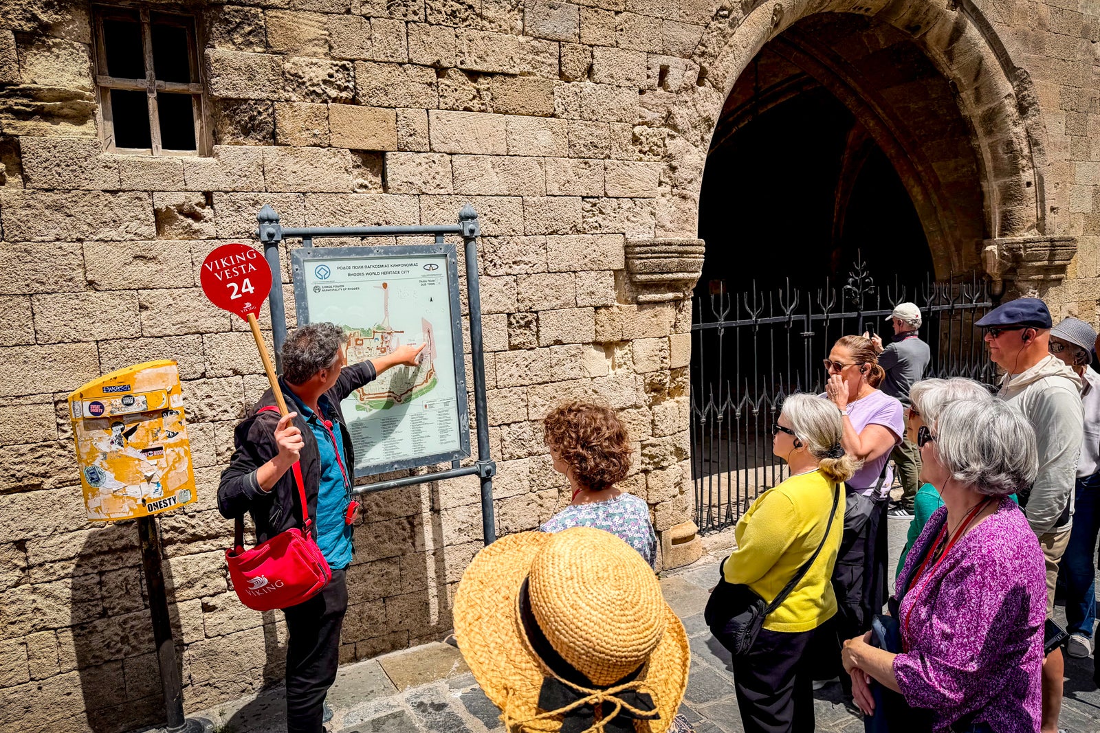 Rhodes tour guide Nikolaos Papadimitriou gives Viking passengers an overview of the town during a walking tour.