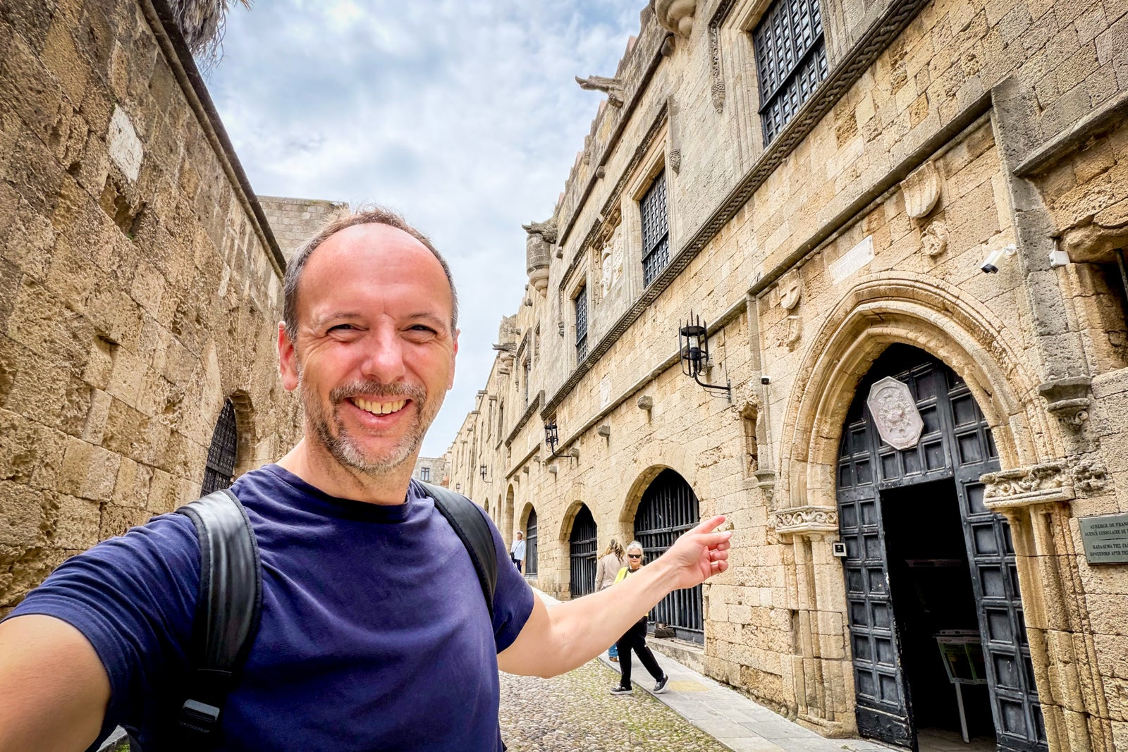 TPG's Gene Sloan poses along the Street of the Knights in Rhodes.