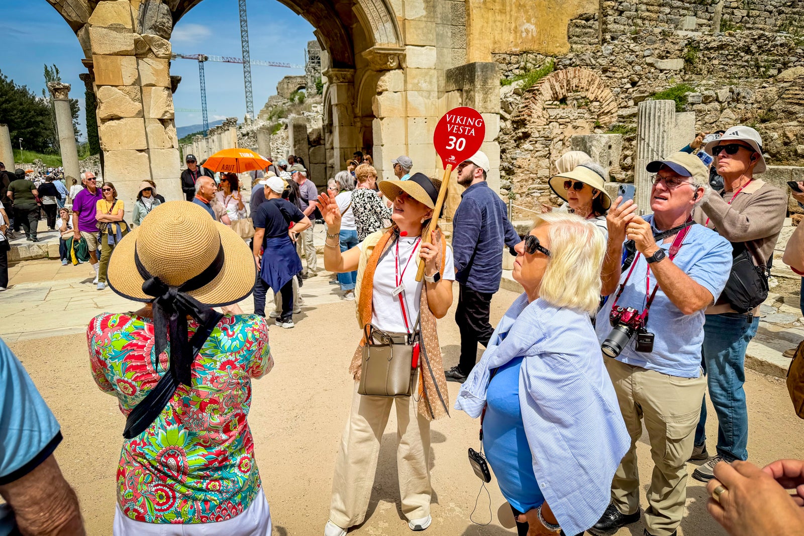 A guide leading a Viking tour at the ruins of Ephesus in Turkey.