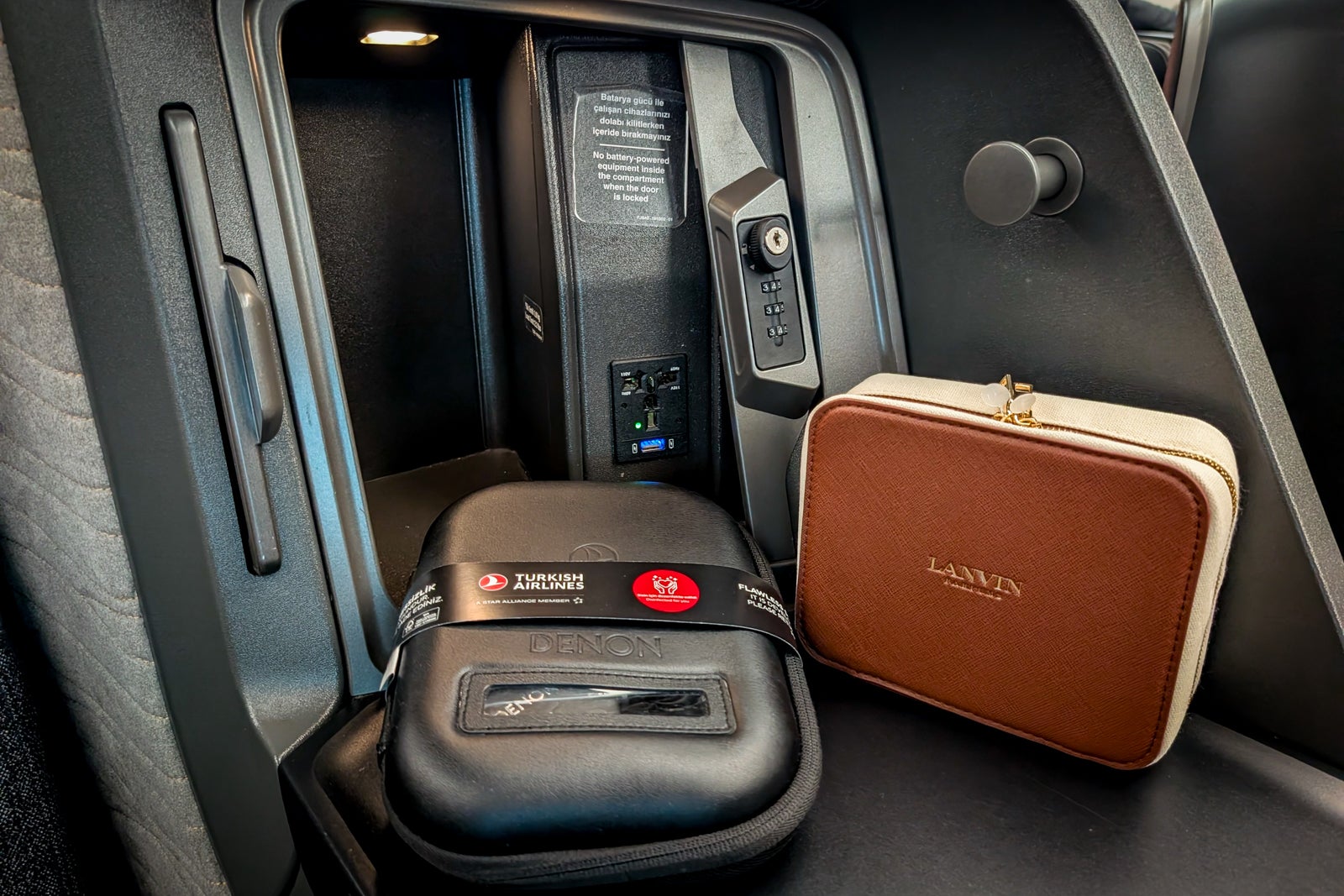 Lockable cubby at a Turkish Airlines A350-900 business class seat