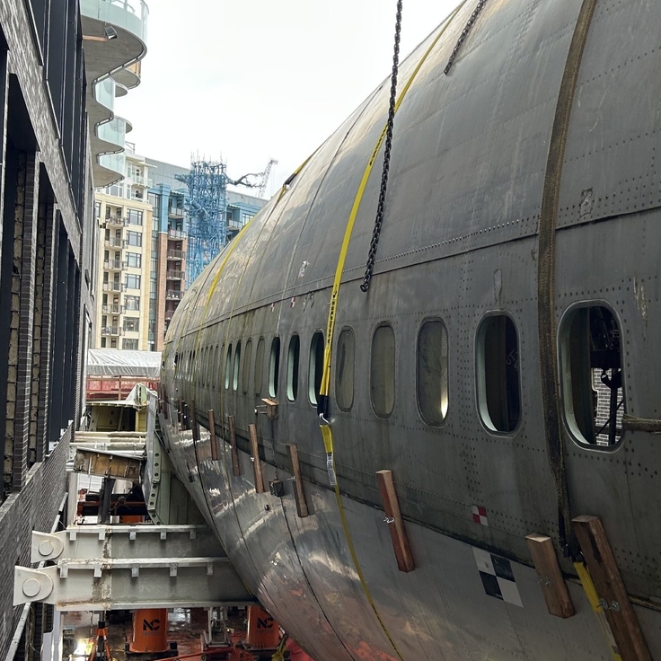 AvGeek alert: There's a 747-fuselage suspended between 2 Seattle high rises