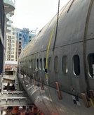 AvGeek alert: There's a 747-fuselage suspended between 2 Seattle high rises