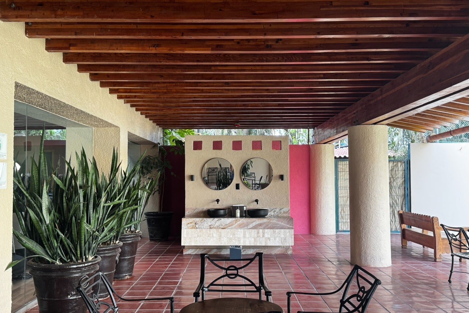 Exterior lounge space with seating and tiling at Westin Playa Vallarta