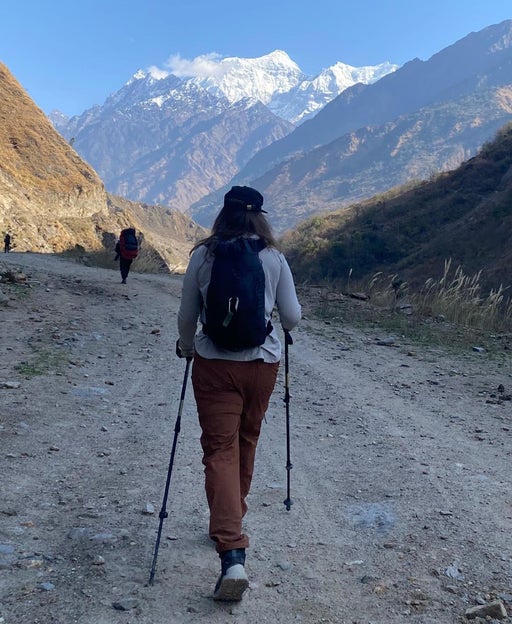Person hiking along trail in Nepal