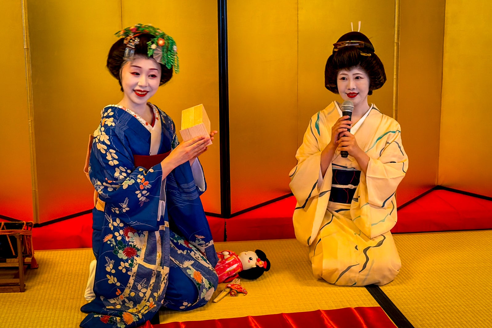 Apprentice geisha known as maiko perform for passengers in Akita.