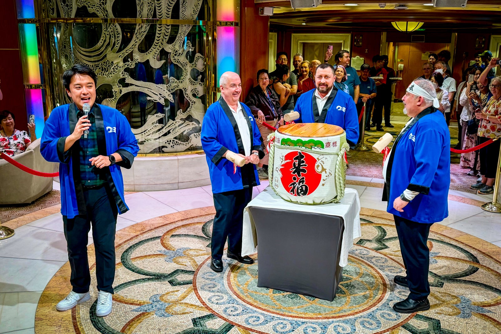 Top officers of Diamond Princess kick off the sailing with a traditional Kagami Biraki sake barrel-opening ceremony.