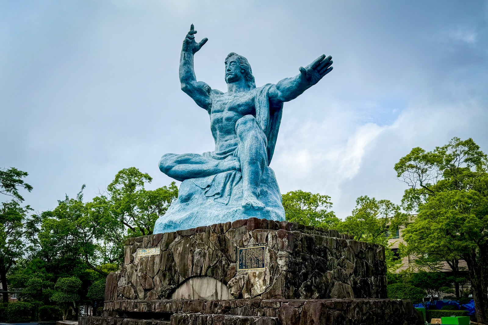 The iconic Peace Statue near is nearby ground zero, part of the Nagasaki Peace Park.