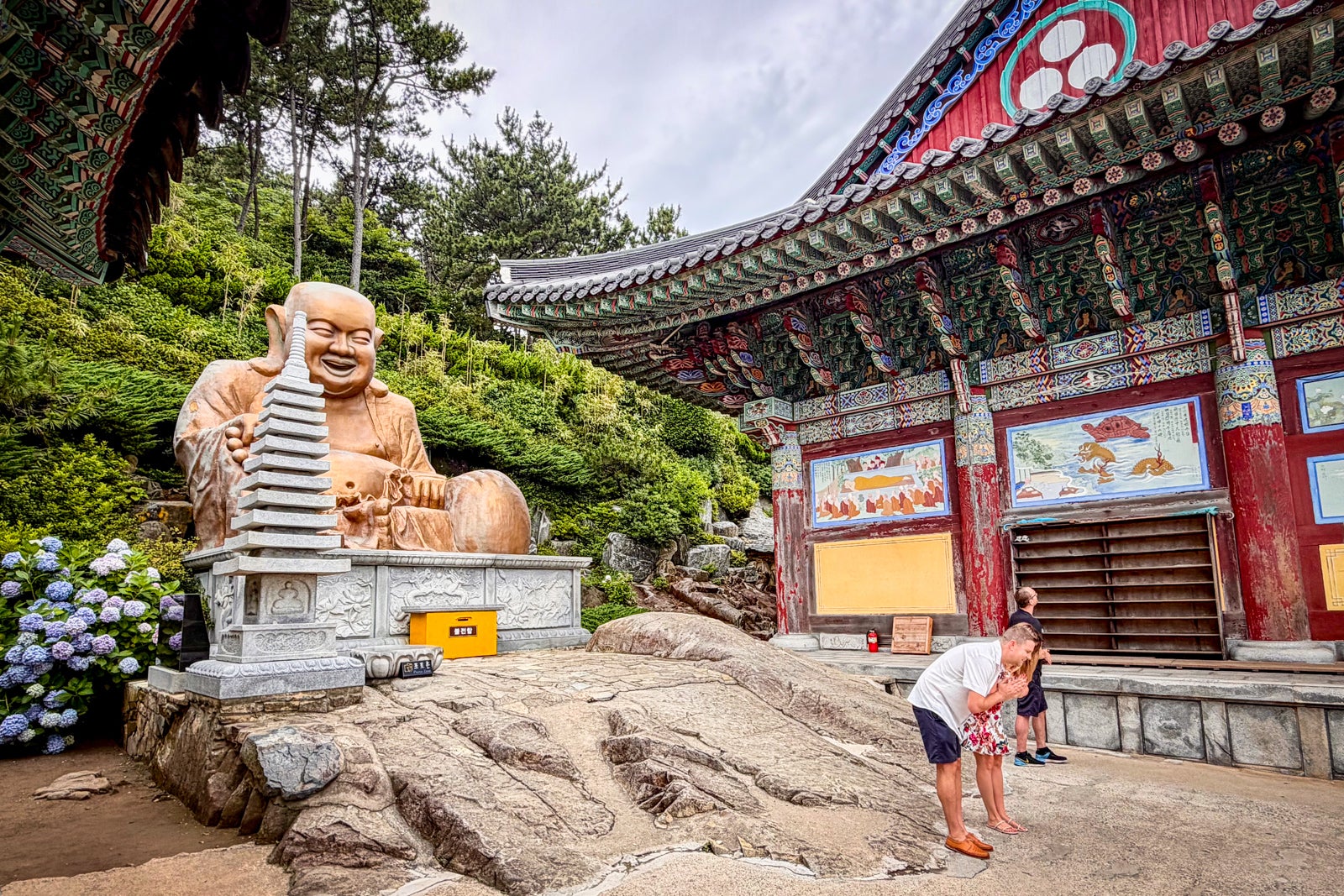 A large smiling buddha is among the attractions at the Haedong Yonggungsa Temple.