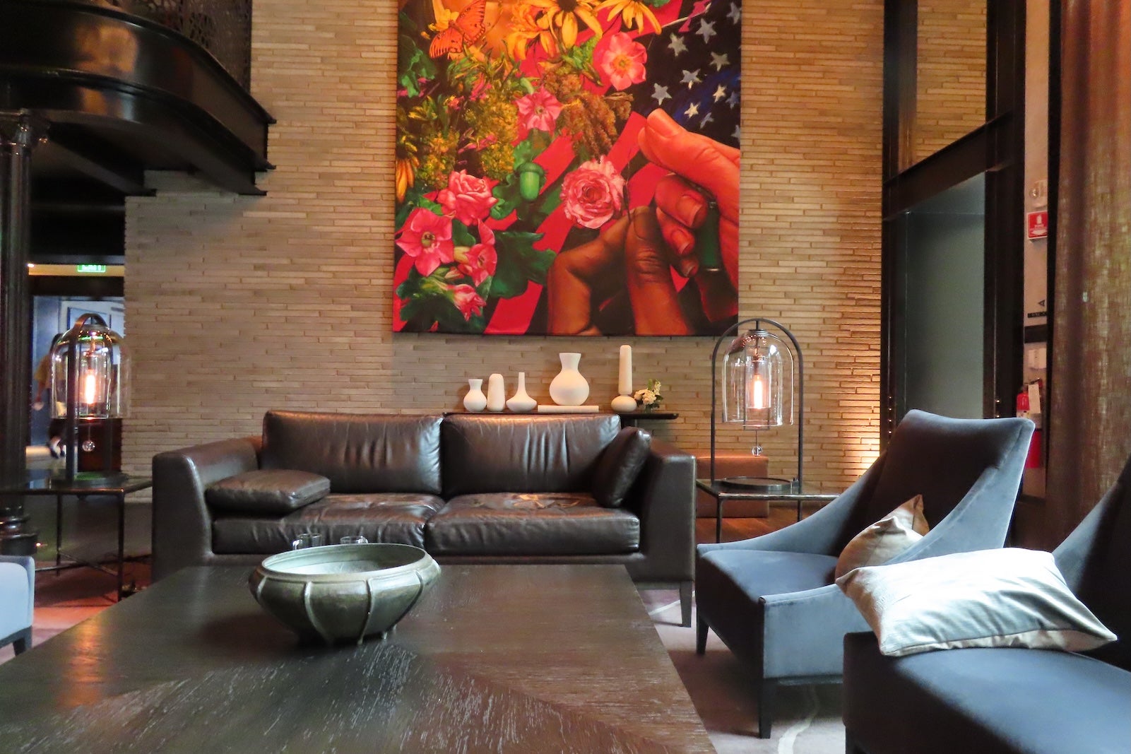 Hotel lobby with couches chairs and art