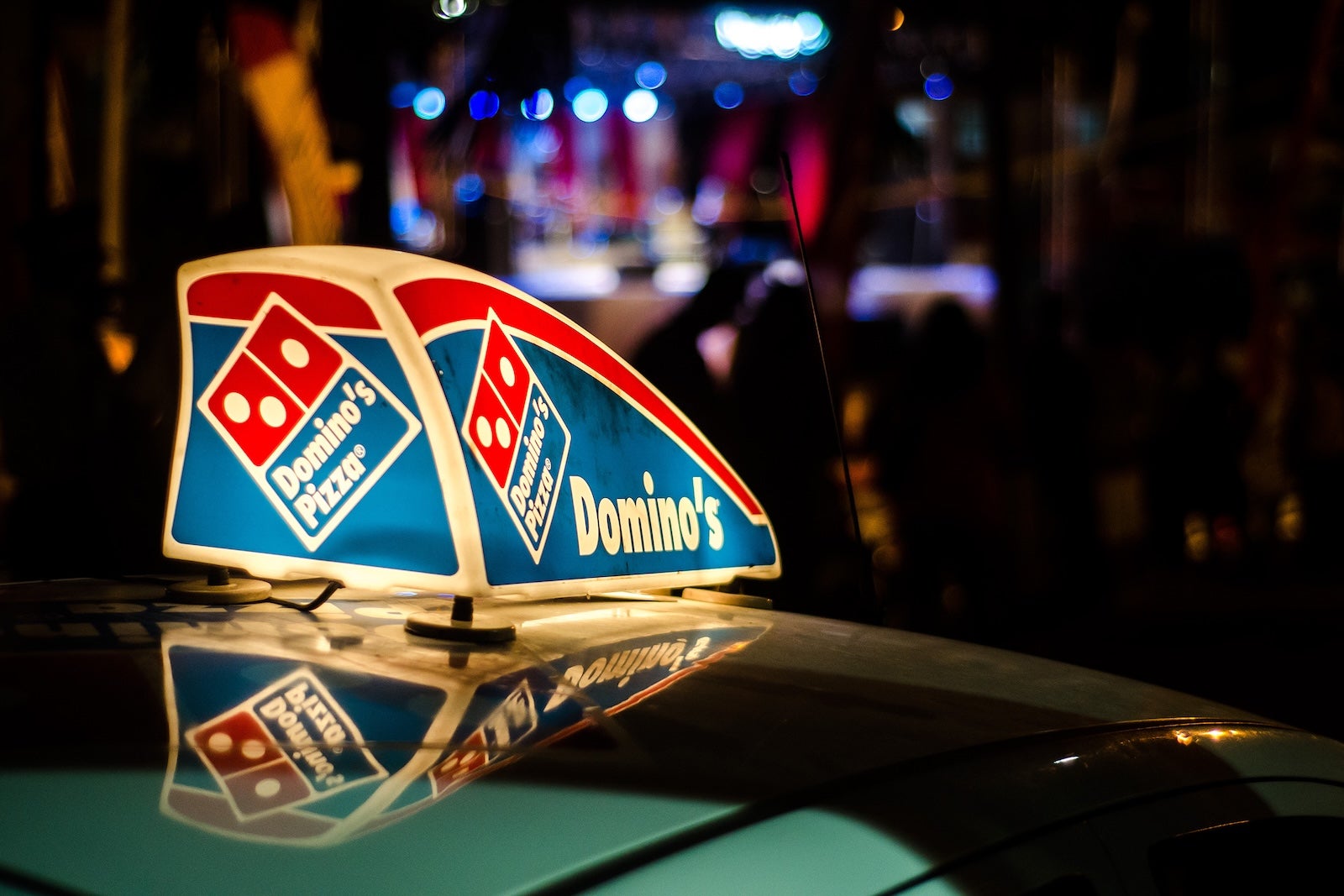 The top of a Domino's delivery car