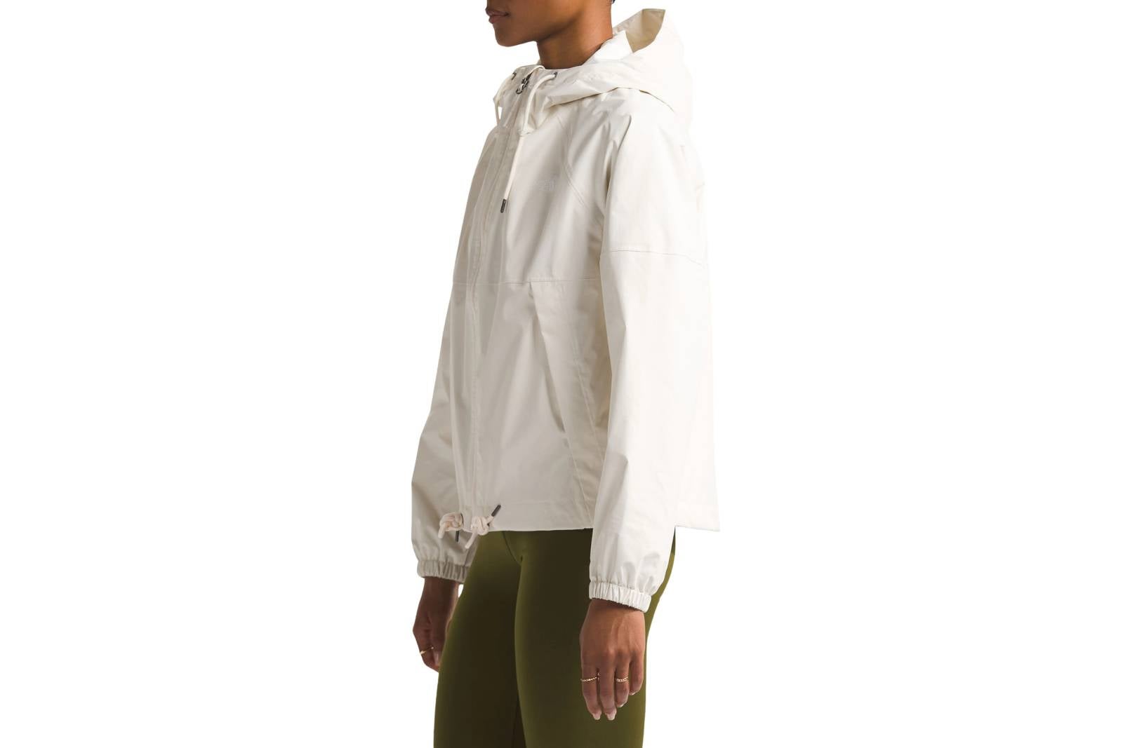 Woman wearing white rain jacket